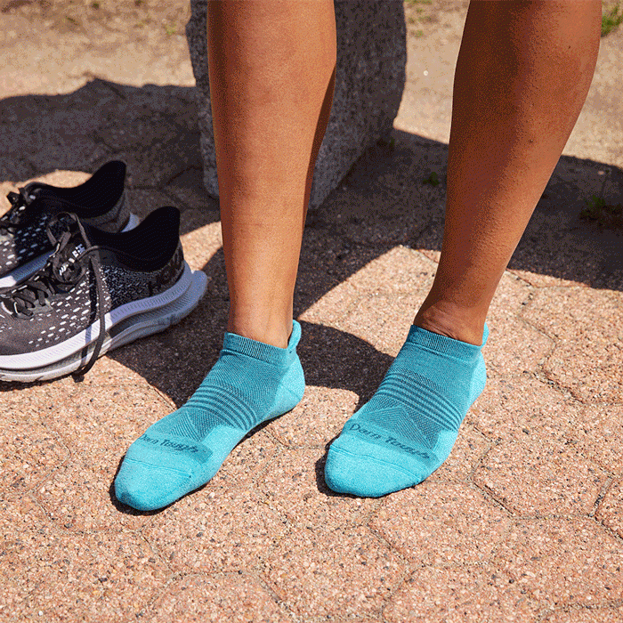 Shop Run socks - runners wearing colorful socks in various heights