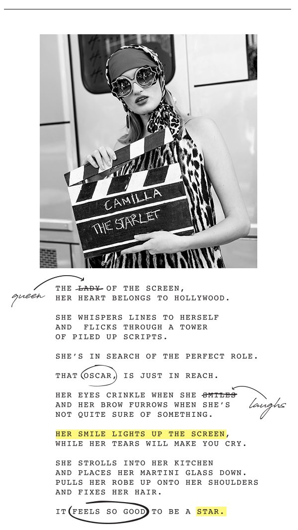 Hollywood Styled model holding a Clapperboard. Written is: "CAMILLA THE STARLET"