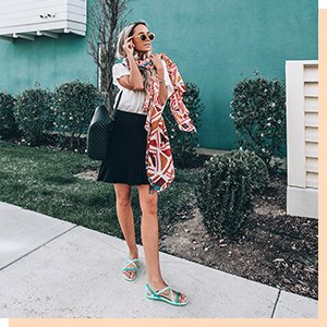 Influencer wearing the Women's Crocs Isabella Cut-Out Graphic Strappy Sandals