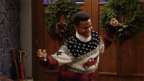 Totally radical gif of Carlton in a Christmas jumper