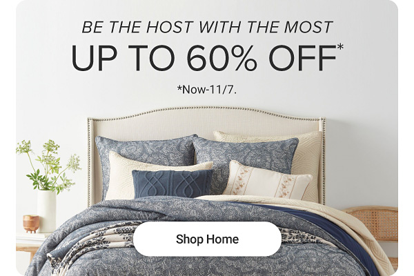 Be the host with the most. Up to 60% off. Now to November 7th. Shop home. A bed with blue patterned bedding.