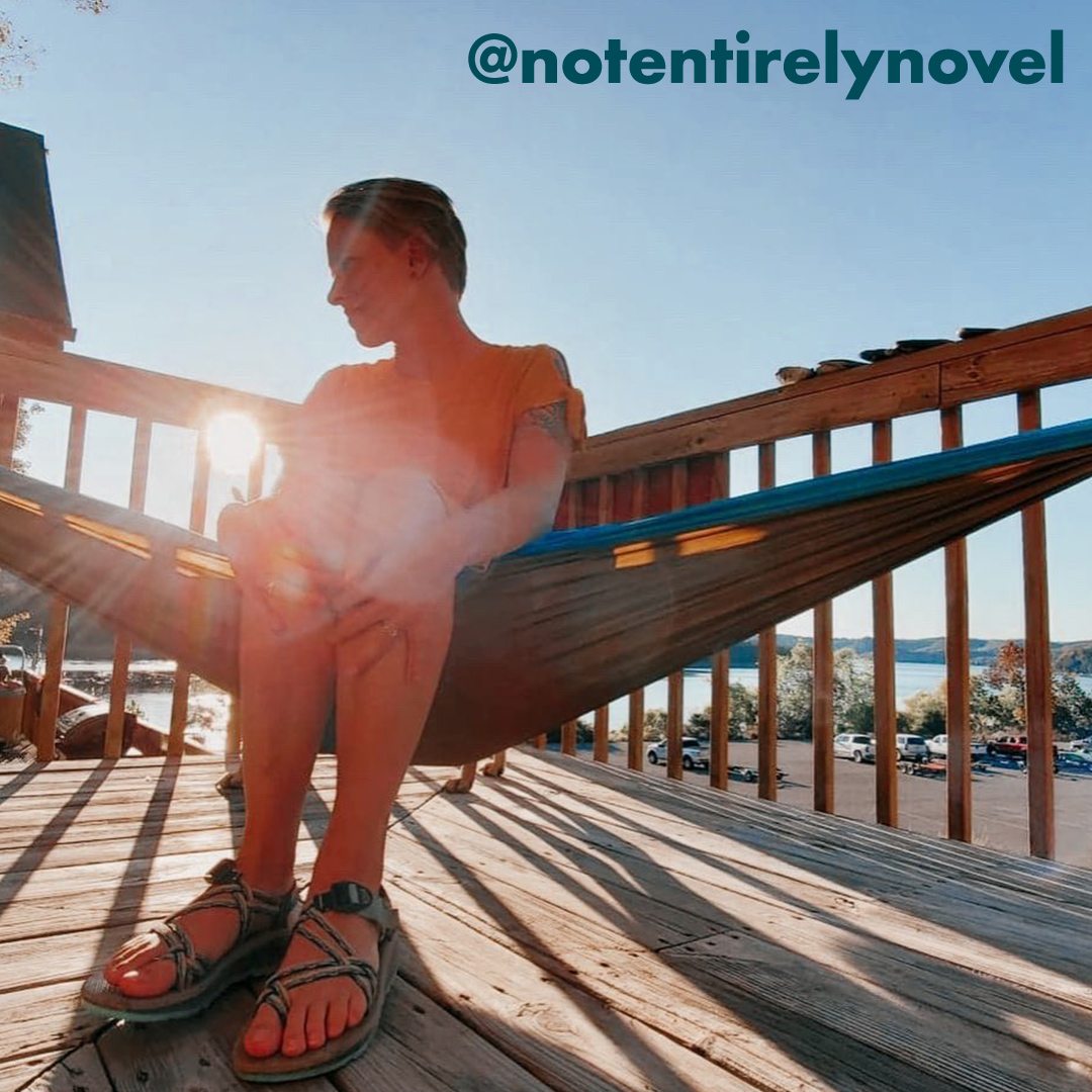 Sandals model outside on a deck sitting in a hammock, social tag: @notentirelynovel