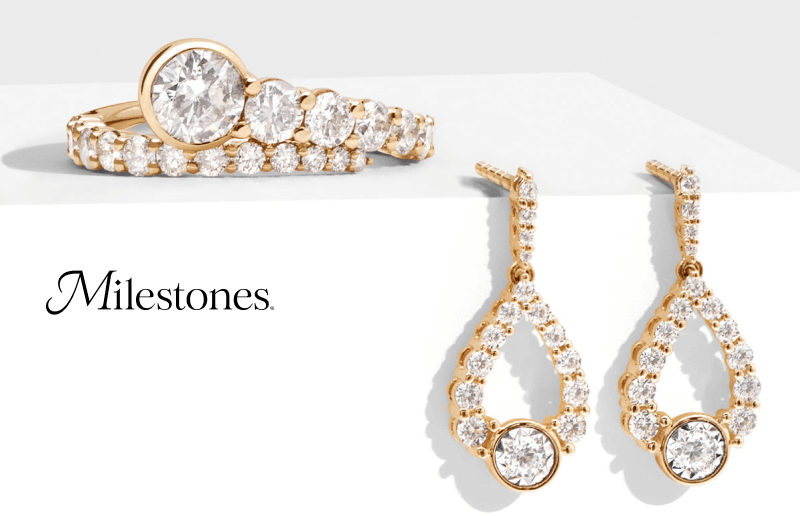 Display of Milestones jewelry, include a bypass diamond ring and teardrop earrings