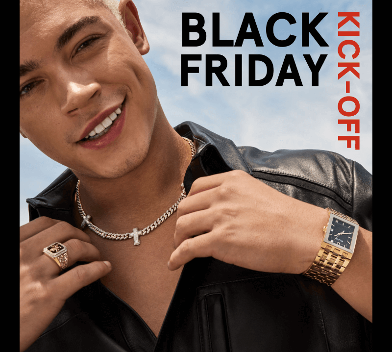 BLACK FRIDAY LICK-OFF. A man happily poses, showcasing his new stunningJewelry - Necklace, Ring and Watch.