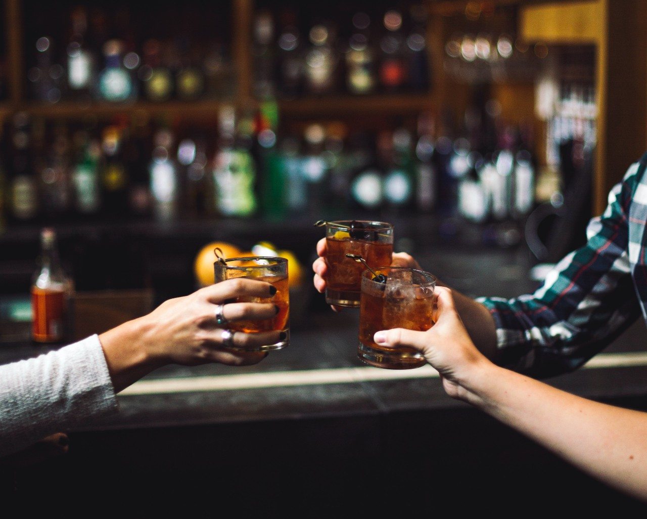 Tumbler glasses with bourbon.