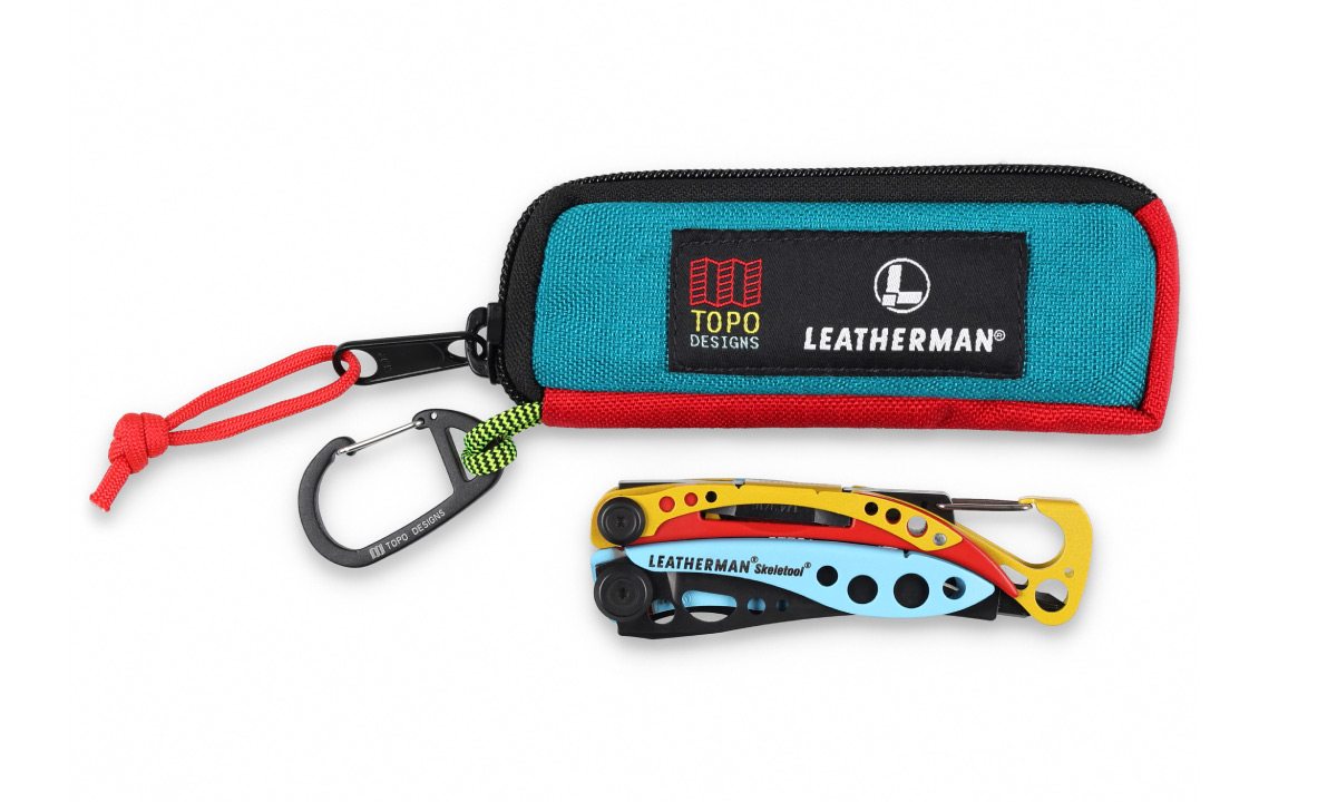 THE SKELETOOL SET - A BLUE, RED AND BLACK SHEATH NEXT TO THE YELLOW, BLACK, BLUE, AND RED TOOL