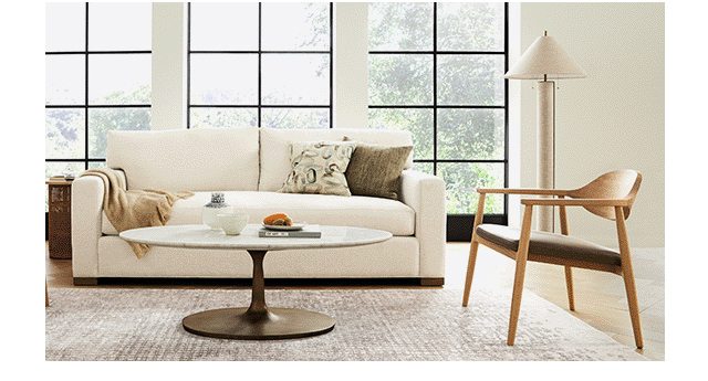 EASY DOES IT Our Axis collection is well-loved for its deep seats and low back cushions that encourage lounging. →