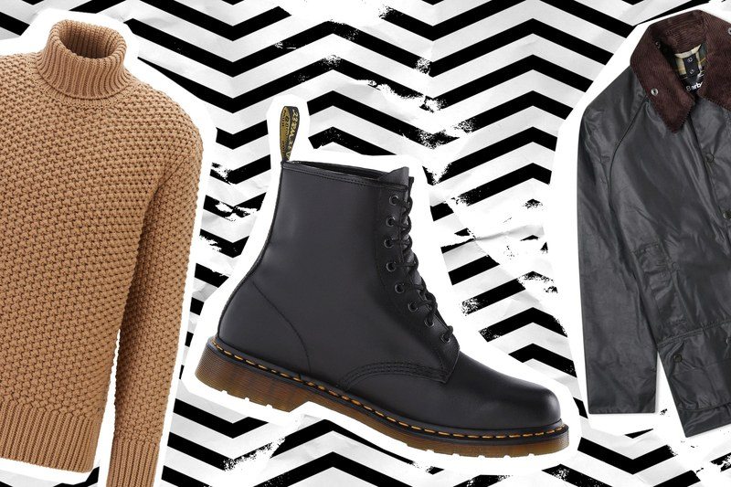 A sweater, a boot, and jacket on a paper background 