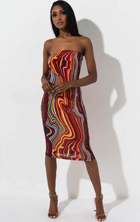 The AKIRA Label Trippy Mood Midi Dress is a multicolored, patterned dress complete with a strapless design, bodycon fit and midi length.