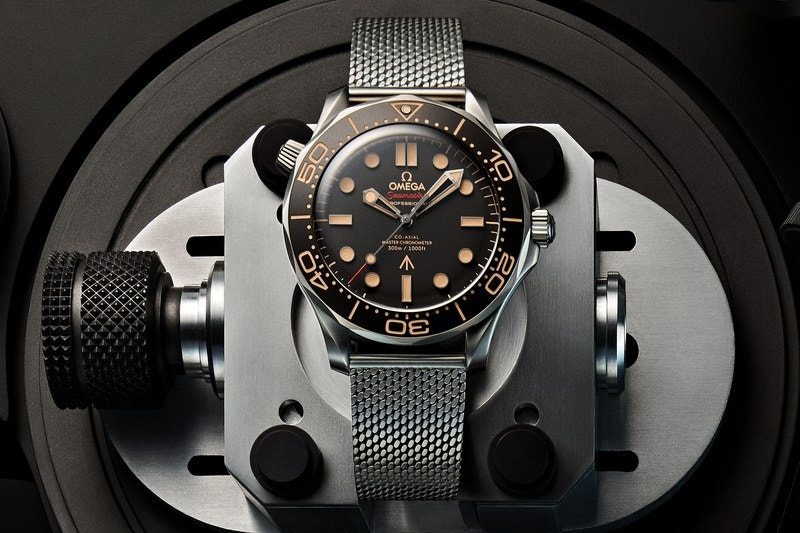 a watch on a dark technical equipment background