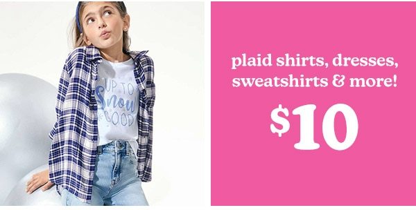 Plaid shirts, dresses, sweatshirts & more! $10. Model wearing evsie clothing.