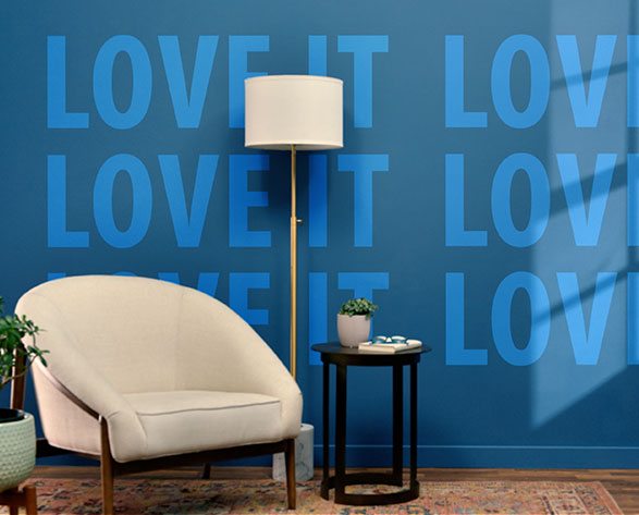 Image of a painted room with the words, Love It, painted on the walls.