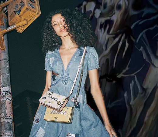 Model with Coach Crossbody Bags