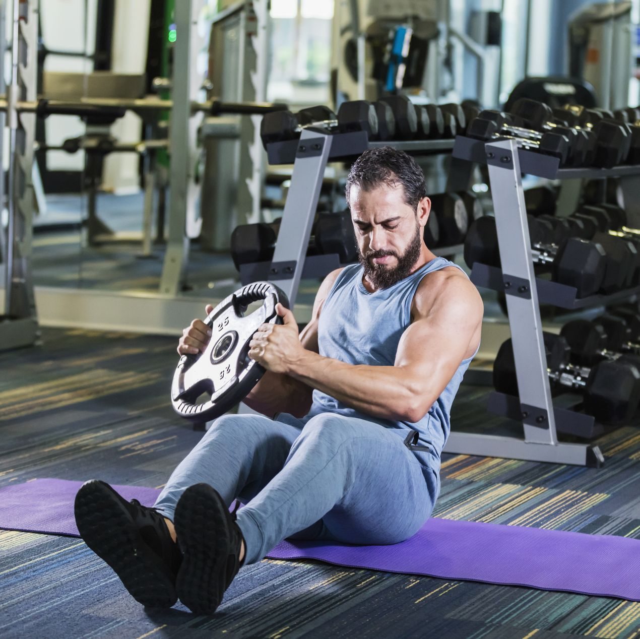 10 Weighted Ab Exercises to Upgrade Your Workouts