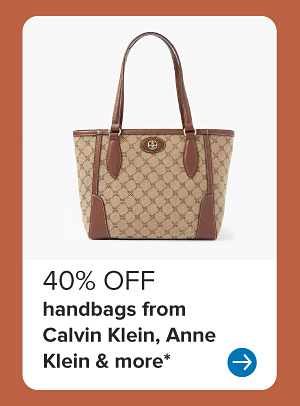 A brown and tan handbag. 40% off handbags from Calvin Klein, Anne Klein and more.