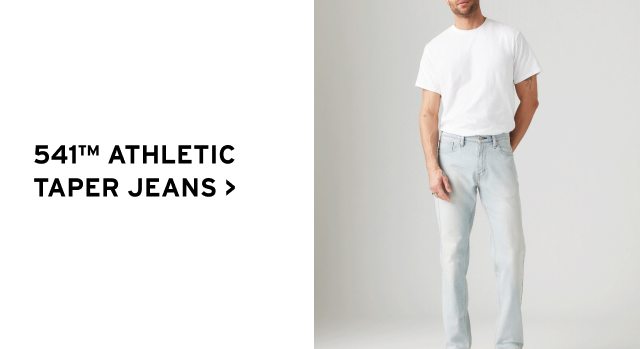 541® ATHLETIC TAPER JEANS