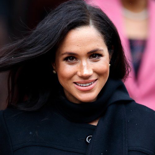 Meghan Markle smiling during a visit to Bristol, England.