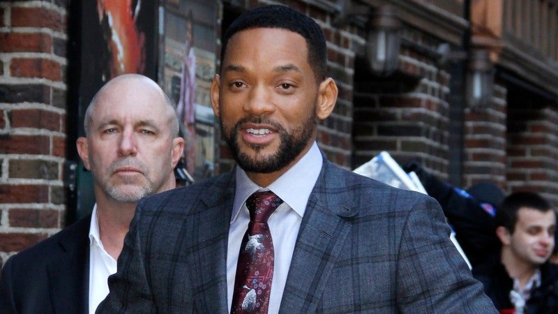Image may contain: Tie, Accessories, Accessory, Suit, Coat, Clothing, Overcoat, Apparel, Will Smith, Human, and Person