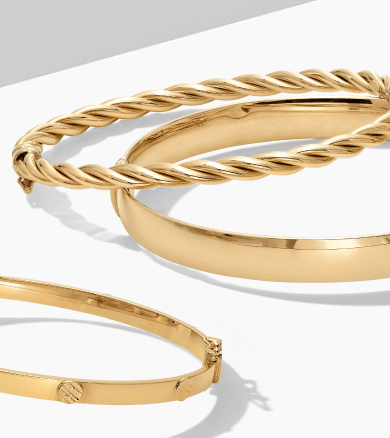 Image chowcasing stunning Gold Bracelets.