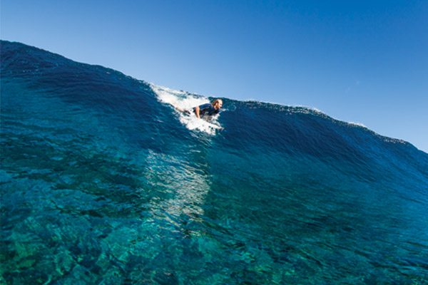 Owen Dropping in at Teahupoo, Tahiti