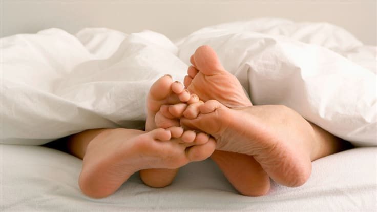 couples feet touching