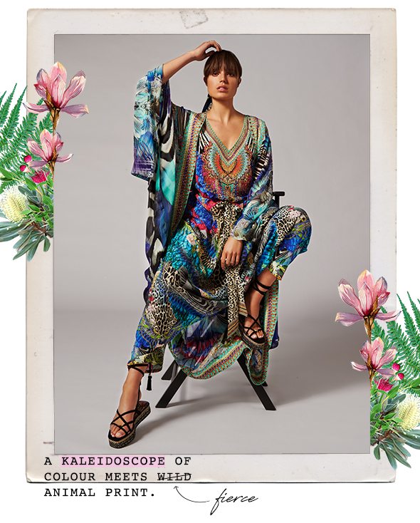 A kaleidoscope of colour meets fierce animal print | Blouse, pants and layer with blue and pink detialing