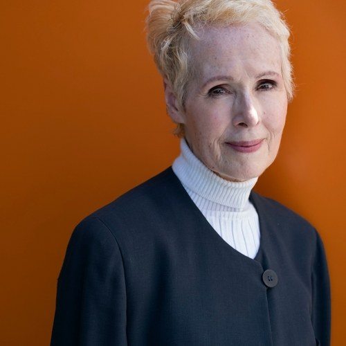 Writer E. Jean Carroll against red background.