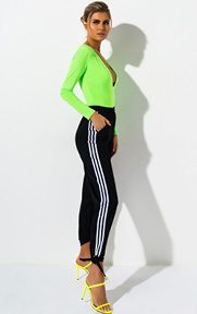 The adidas Womens Track Pant is a smooth knit, athleisure inspired track pant complete with a high waist rise, elastic waistband, two front pockets, the brand’s signature side stripe detailing and tie ankle hems.