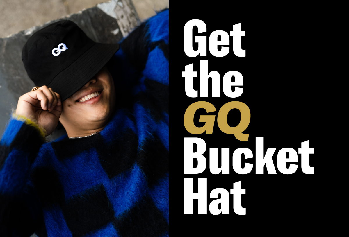 Always in style. A person wearing the GQ bucket hat.